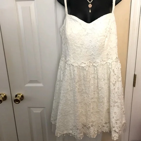 B Darlin white lace dress with crinling.